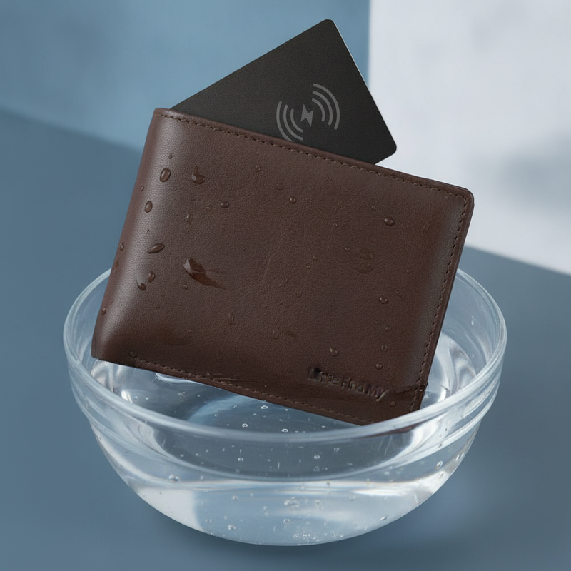 A black MFi GPS Wallet Tracker Card is discreetly placed inside a dark leather wallet, partially submerged in water.